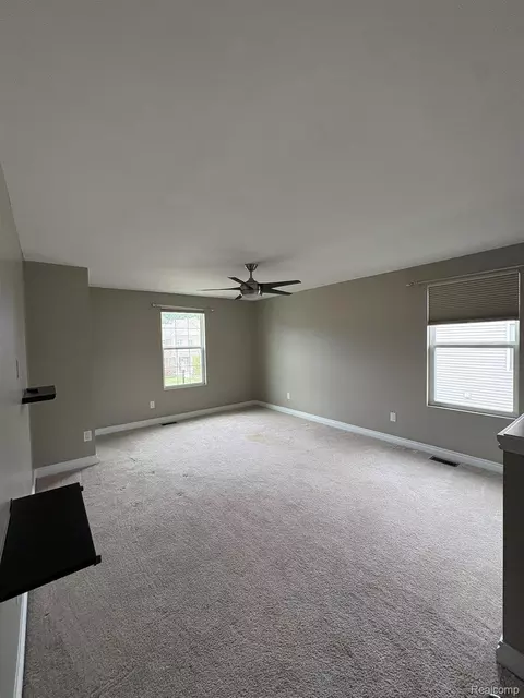 Living - 16308 Adelaide Dr, Macomb, MI 48044 photo 2 of 2