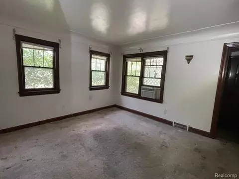 Living - 8930 Wayne Rd, Romulus, MI 48174 photo 2 of 3