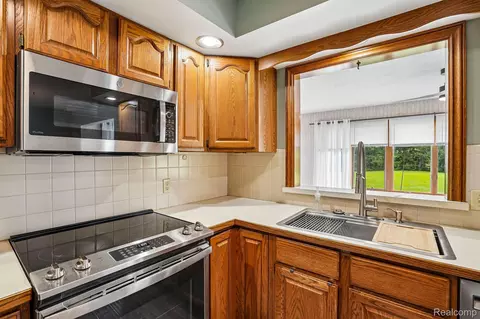 Kitchen - 3981 S State Rd, Shiawassee, MI 48867 photo 3 of 4