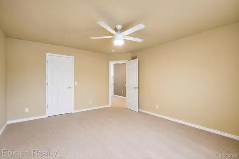 Bedroom - 5675 Golf Pointe Dr, Village Of Clarkston, MI 48348 photo 3 of 9