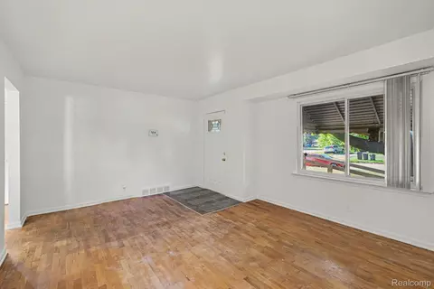 Living - 1210 Simca St, Flint, MI 48507 photo 2 of 2