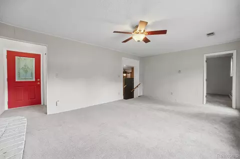 Living - 11897 Shaffer Rd, Springfield, MI 48350 photo 2 of 4