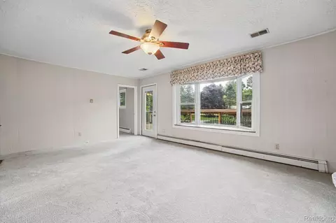 Living - 11897 Shaffer Rd, Springfield, MI 48350 photo 3 of 4
