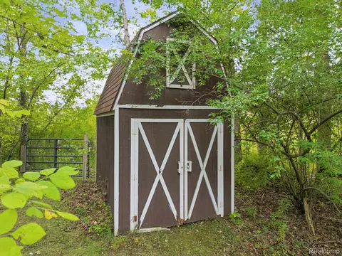 Exterior - 11897 Shaffer Rd, Springfield, MI 48350 photo 8 of 9