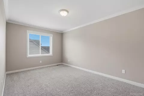 Bedroom - 52908 Harmony Dr, Macomb, MI 48042 photo 1 of 7