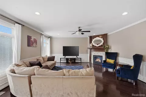 Living - 52908 Harmony Dr, Macomb, MI 48042 photo 2 of 2