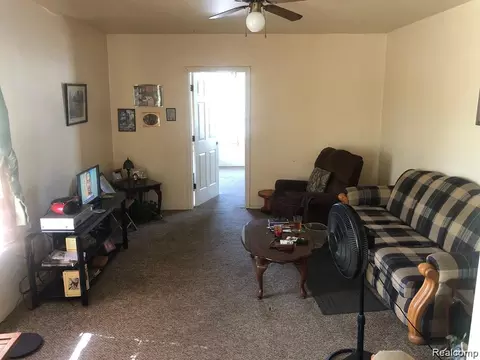 Living - 910 Monroe St, Carleton, MI 48117 photo 2 of 2