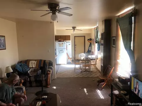 Living - 910 Monroe St, Carleton, MI 48117 photo 1 of 2