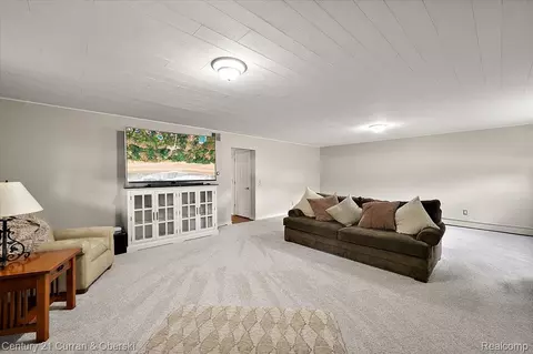 Living - 219 E Caledonia St, Howell, MI 48843 photo 5 of 7