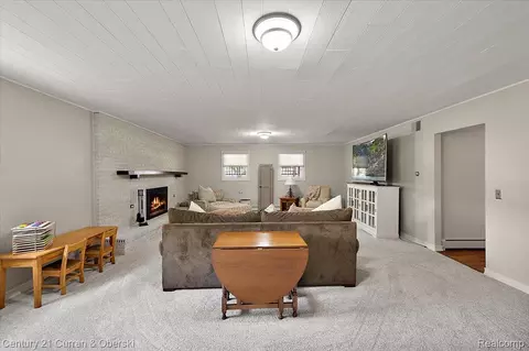 Living - 219 E Caledonia St, Howell, MI 48843 photo 4 of 7