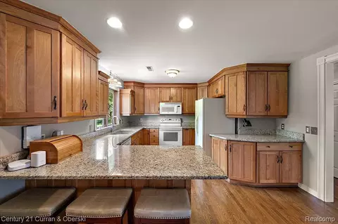 Kitchen - 219 E Caledonia St, Howell, MI 48843 photo 2 of 5