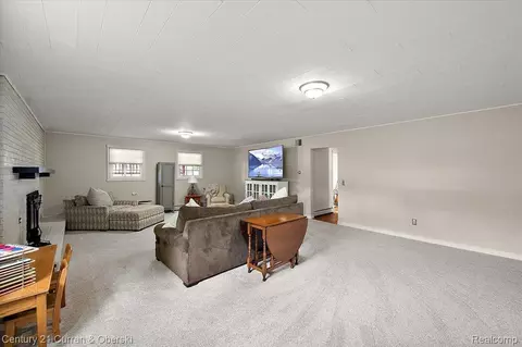 Living - 219 E Caledonia St, Howell, MI 48843 photo 6 of 7