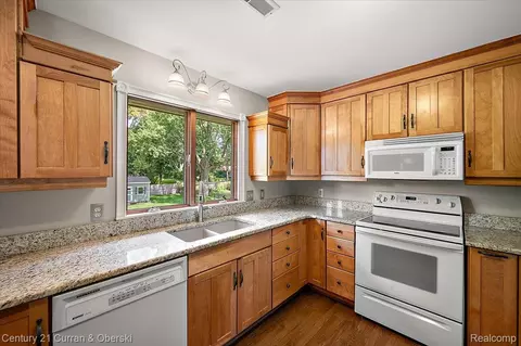 Kitchen - 219 E Caledonia St, Howell, MI 48843 photo 3 of 5