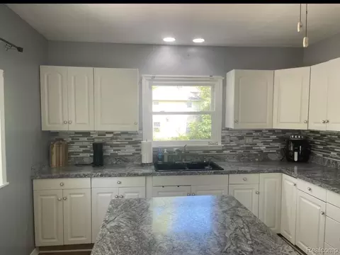 Kitchen - 406 S Elm Ave, Jackson, MI 49203 photo 2 of 3