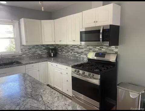 Kitchen - 406 S Elm Ave, Jackson, MI 49203 photo 1 of 3