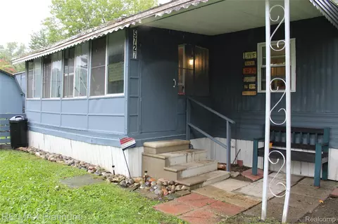 Exterior - 5727 Maunee Dr, Genoa, MI 48843 photo 2 of 9