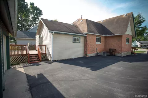 Exterior - 131 E Washington St, Dimondale, MI 48821 photo 11 of 14