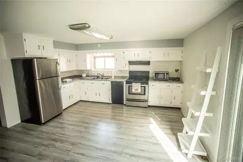 Kitchen - 131 E Washington St, Dimondale, MI 48821 photo 2 of 3