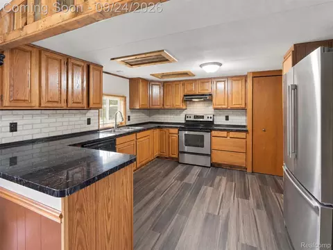 Kitchen - 495 Macduff Dr, Mount Morris, MI 48458 photo 1 of 2