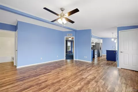Living - 5486 Spring Creek Dr, Howell, MI 48843 photo 3 of 4