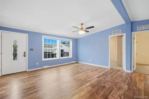 Living - 5486 Spring Creek Dr, Howell, MI 48843 photo 1 of 4