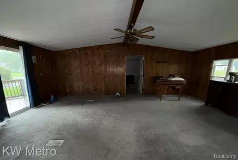 Living - 5552 Cherokee Bnd, Genoa, MI 48843 photo 1 of 2