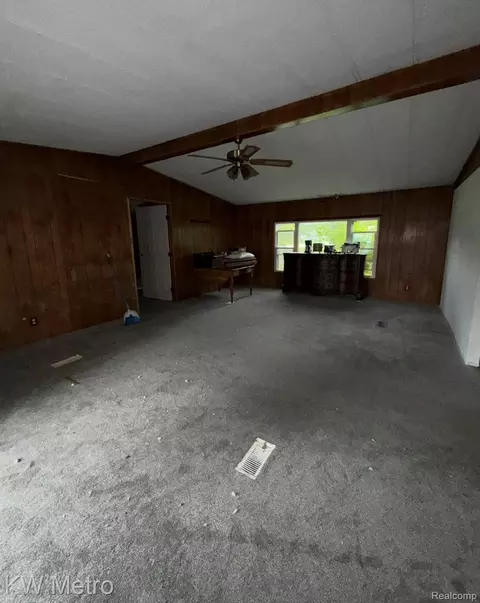 Living - 5552 Cherokee Bnd, Genoa, MI 48843 photo 2 of 2