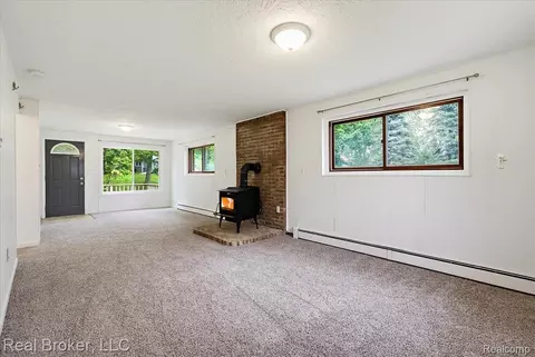Living - 8320 Hillpoint Dr, Brighton, MI 48116 photo 1 of 7