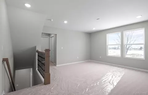 Living - 50649 Crusader Dr, Macomb, MI 48044 photo 1 of 1