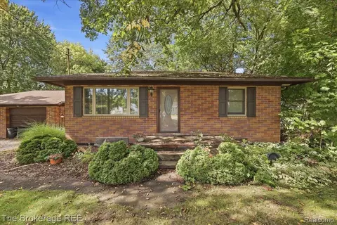 1424 S Belsay Rd, Burton, MI 48509