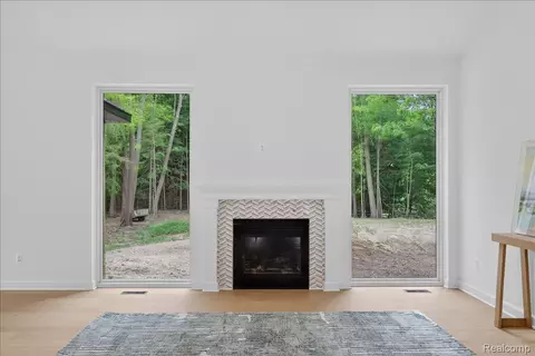 Living - 3133 Farmbrook Ln, Metamora, MI 48455 photo 4 of 11