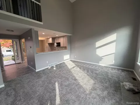 Living - 45636 Limerick Dr, Macomb, MI 48044 photo 1 of 2