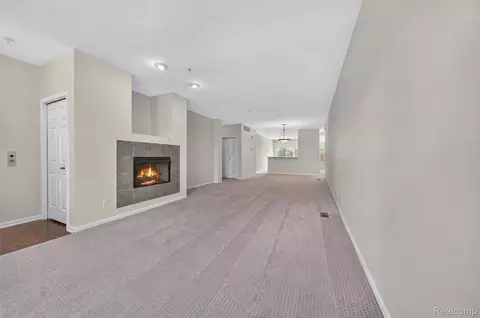 Living - 1450 Devon Ln #128, Troy, MI 48084 photo 2 of 4