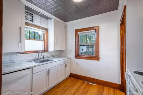 Kitchen - 701 Saint Clair Ave, Flint, MI 48504 photo 1 of 2