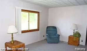 Living - 8036 N Clare Ave, Frost, MI 48625 photo 1 of 2