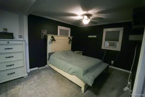 Bedroom - 25991 E Huron River Dr, Flat Rock, MI 48134 photo 4 of 12