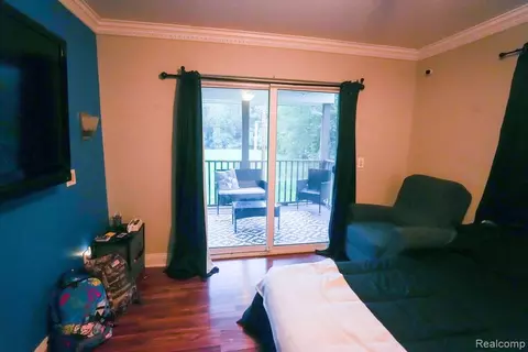 Bedroom - 25991 E Huron River Dr, Flat Rock, MI 48134 photo 2 of 12