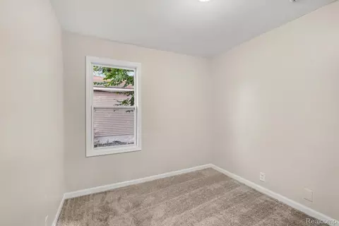 Bedroom - 4409 Cuthbertson St, Flint, MI 48507 photo 6 of 8