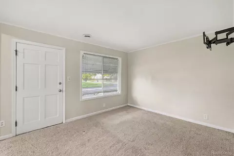 Living - 4409 Cuthbertson St, Flint, MI 48507 photo 1 of 4