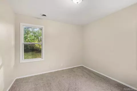 Bedroom - 4409 Cuthbertson St, Flint, MI 48507 photo 5 of 8