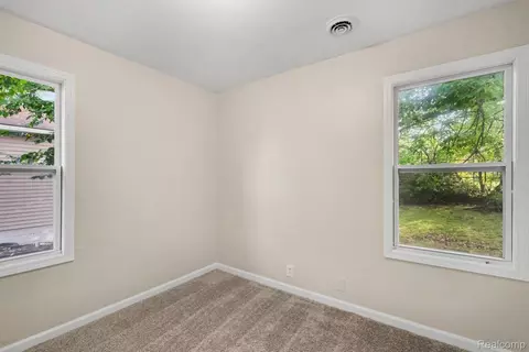 Bedroom - 4409 Cuthbertson St, Flint, MI 48507 photo 7 of 8