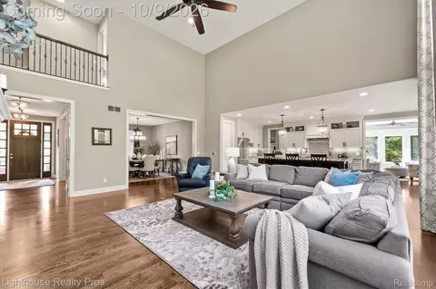 Living - 5648 Ciderberry Dr, Genoa, MI 48116 photo 3 of 4