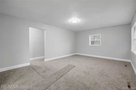 Living - 2830 Plainfield Ave, Flint, MI 48506 photo 2 of 2