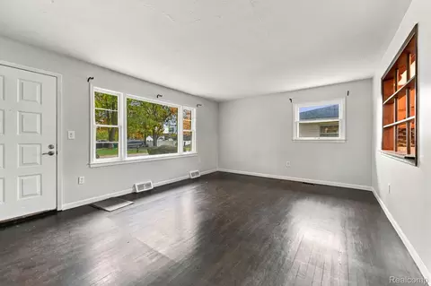 Living - 9350 Biddle St, Romulus, MI 48174 photo 2 of 3
