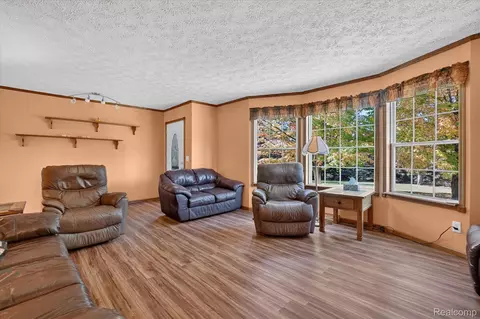 Living - 3876 Harmon Rd, Duplain, MI 48879 photo 2 of 2