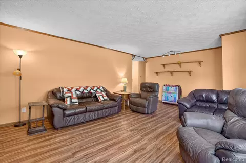 Living - 3876 Harmon Rd, Duplain, MI 48879 photo 1 of 2