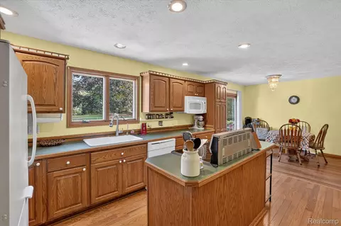 Kitchen - 3876 Harmon Rd, Duplain, MI 48879 photo 3 of 4
