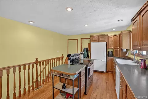 Kitchen - 3876 Harmon Rd, Duplain, MI 48879 photo 2 of 4