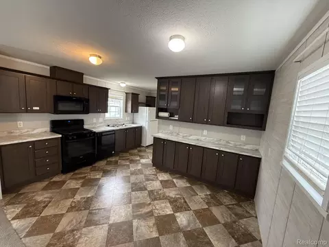 Kitchen - 138 E Lagrande St, Howell, MI 48843 photo 3 of 4