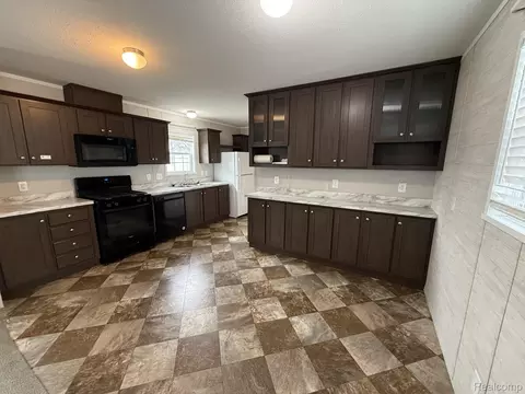 Kitchen - 138 E Lagrande St, Howell, MI 48843 photo 2 of 4